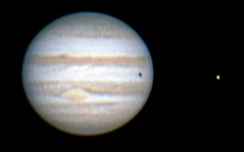 Jupiter showing the Great Red Spot and a shadow transit of Europa.